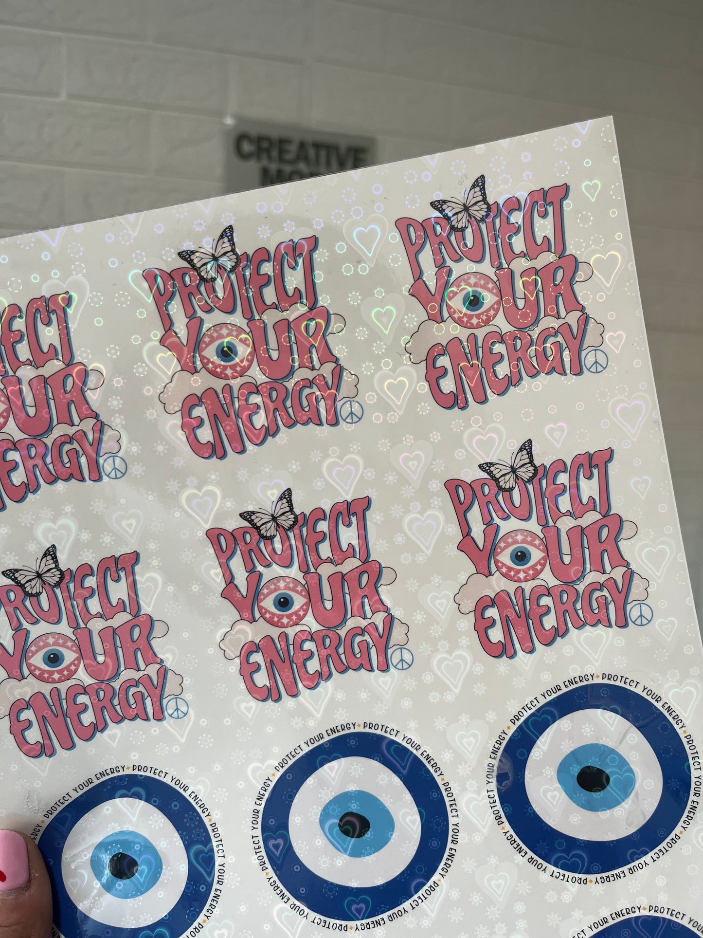 Plancha de stickers con laminado holográfico personalizados